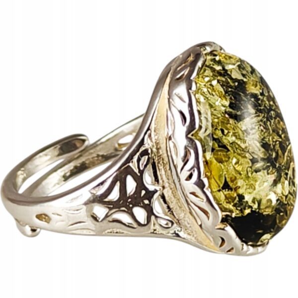 Pierścionek srebrny z bursztynem - owalny z ażurowym zdobieniem