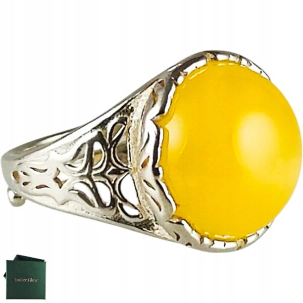 Pierścionek srebrny z bursztynem - okrągły z ażurowym zdobieniem